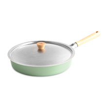 Nordic Ware Cardamom 12-inch nonstick frying pan with glass lid, cream colored aluminum cookware on white background