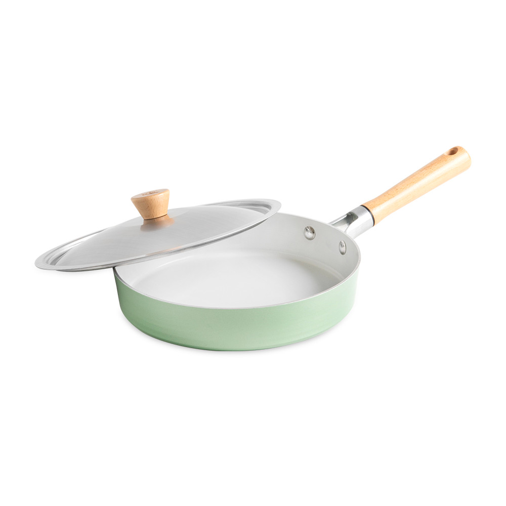 Nordic Ware Cardamom 10-inch nonstick frying pan with glass lid, cream exterior and dark interior
