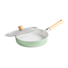 Nordic Ware Cardamom 10-inch nonstick frying pan with glass lid, cream exterior and dark interior