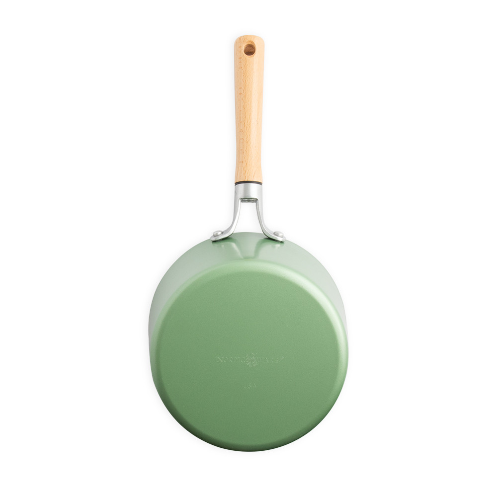 Nordic Ware 3-quart ceramic nonstick saucepan in cardamom color, overhead view showing exterior