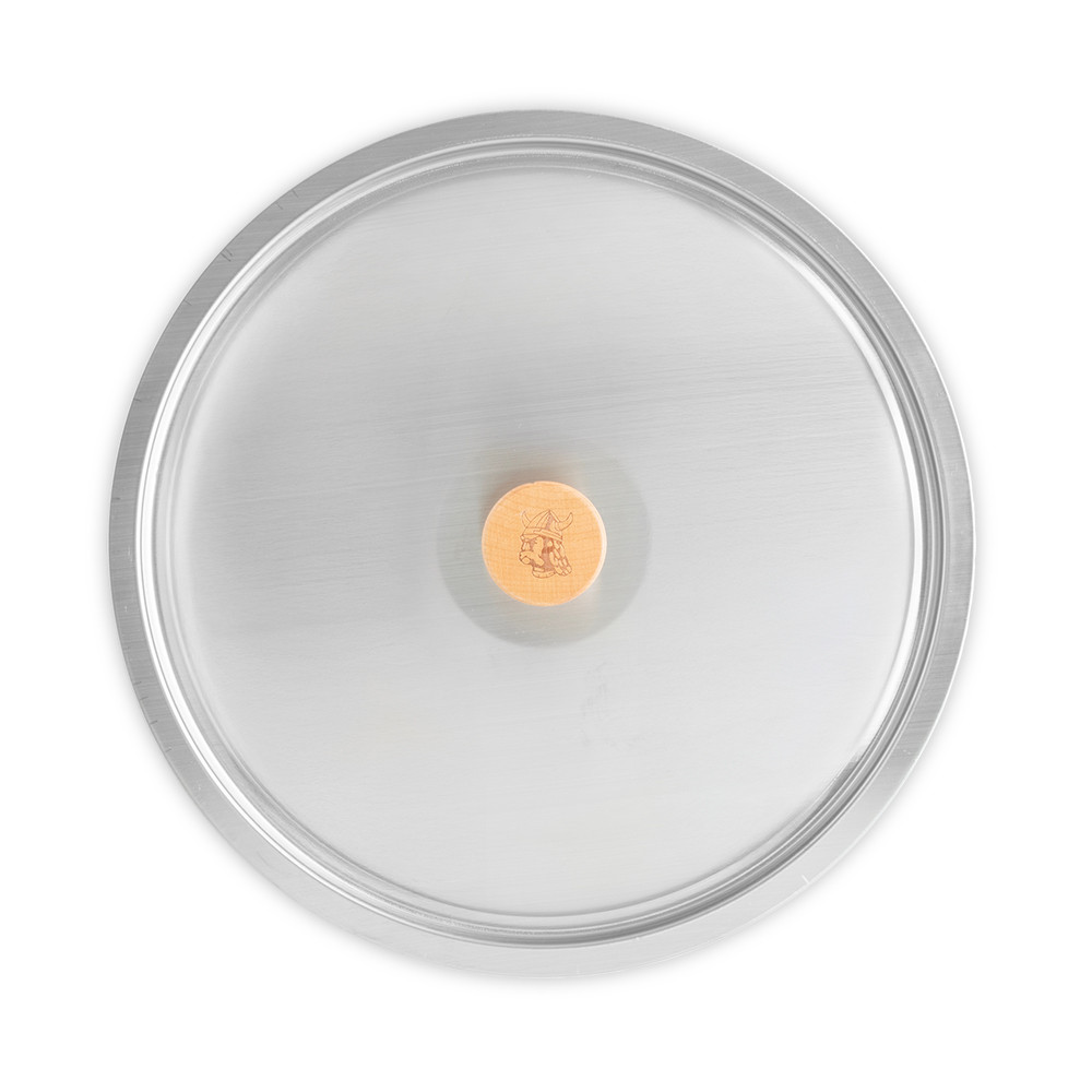 Nordic Ware 12-inch stainless steel lid with cardamom-inspired design, circular with centered handle