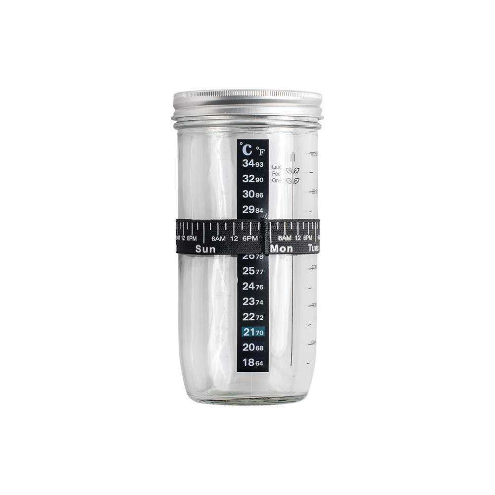 Glass jar with metal lid containing sourdough starter, part of Nordic Ware Simply Sourdough Bread Baking Kit