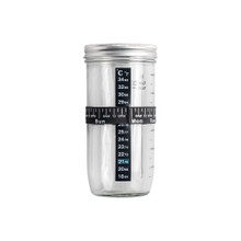 Glass jar with metal lid containing sourdough starter, part of Nordic Ware Simply Sourdough Bread Baking Kit