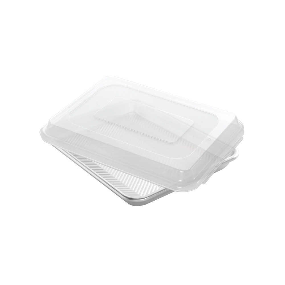 Nordic Ware aluminum quarter sheet pan with clear plastic lid, natural silver finish, shown at angle