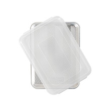 Nordic Ware aluminum quarter sheet baking pan with clear plastic lid, natural silver finish, overhead view