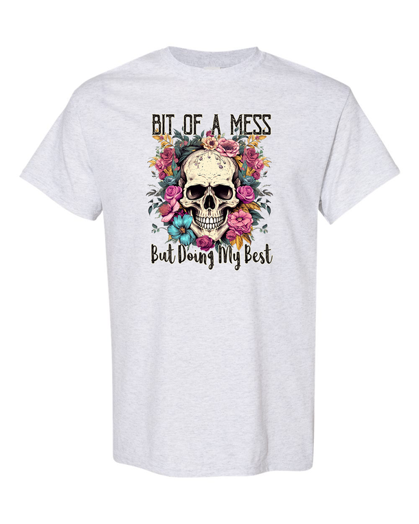 Grey heavy cotton t-shirt with a skull and the saying "A Bit Of A Mess, But Doing My Best"