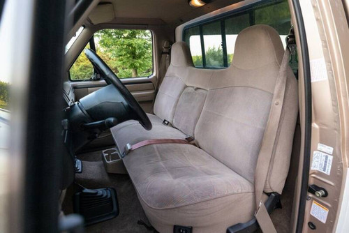 F215 1993-1998 Ford F150-F350 Regular, XCab and Crew Cab Front Solid Bench Seat with Molded Headrests and Integrated Center Armrest.