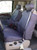 F82    2001-2009 Ford F250-F550 Front Low Back Captain Chairs with Adjustable Headrests, Integrated Seat Belts and One Armrest Per Seat