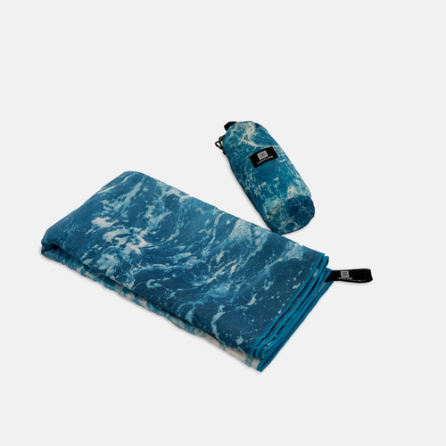 Microfiber beach towel with storage bag