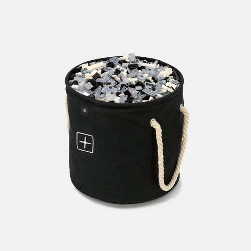 CratePlay™ Toy Storage Bag filled with gray building bricks and small parts for quick playroom cleanup.