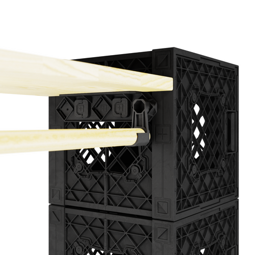 Close-up of a UbeCube™ crate corner showing detailed installation of bundle hardware for secure assembly. Close-up of a UbeCube™ crate corner showing detailed installation of bundle hardware for secure assembly.