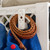 UbeCube CrateHook™ (crate-accessory) attached to a white UC01 crate and holding a braided leather belt as part of a CrateKicks™ closet setup (belt-storage, accessory-organization, modular-closet)