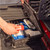 BaseBox™ being accessed inside vehicle trunk showing organized emergency and tool storage
