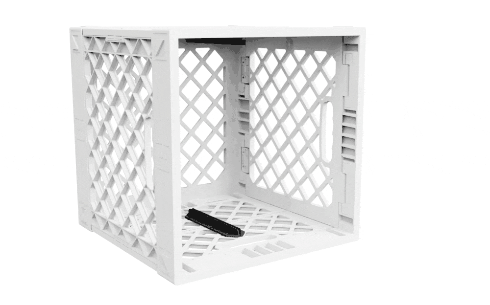 Animated GIF showing a 2x2 Divider Kit being installed into a white UC02 lidless UbeCube crate.