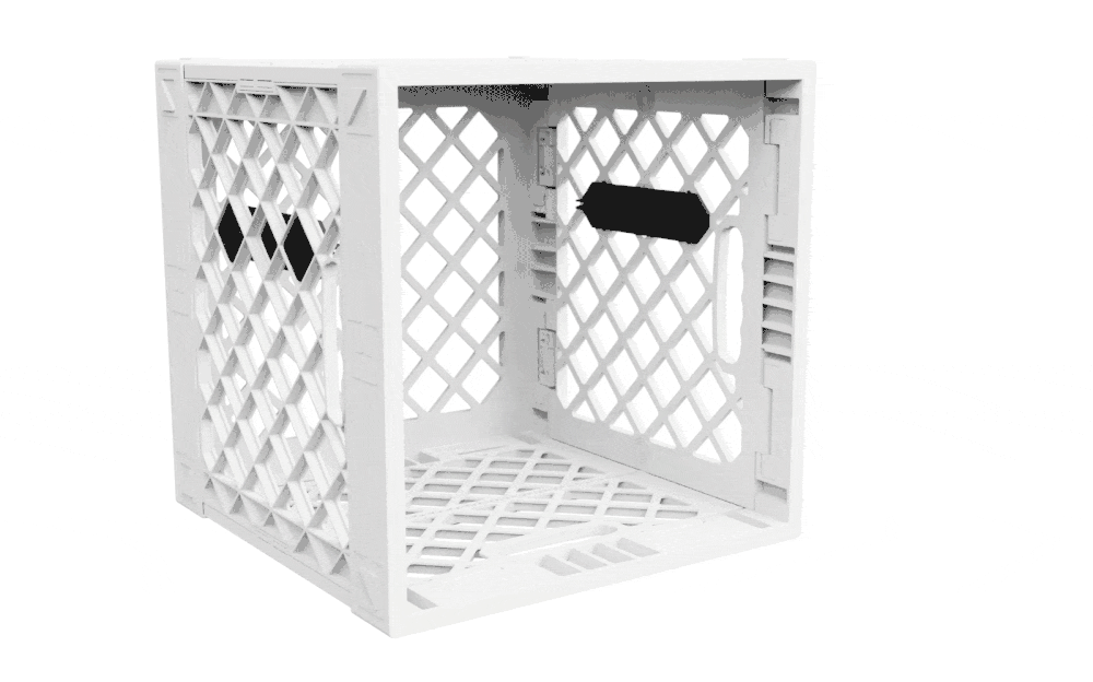 Animated GIF showing a 3x3 Divider™ kit being installed into a white UC02 lidless UbeCube crate.
