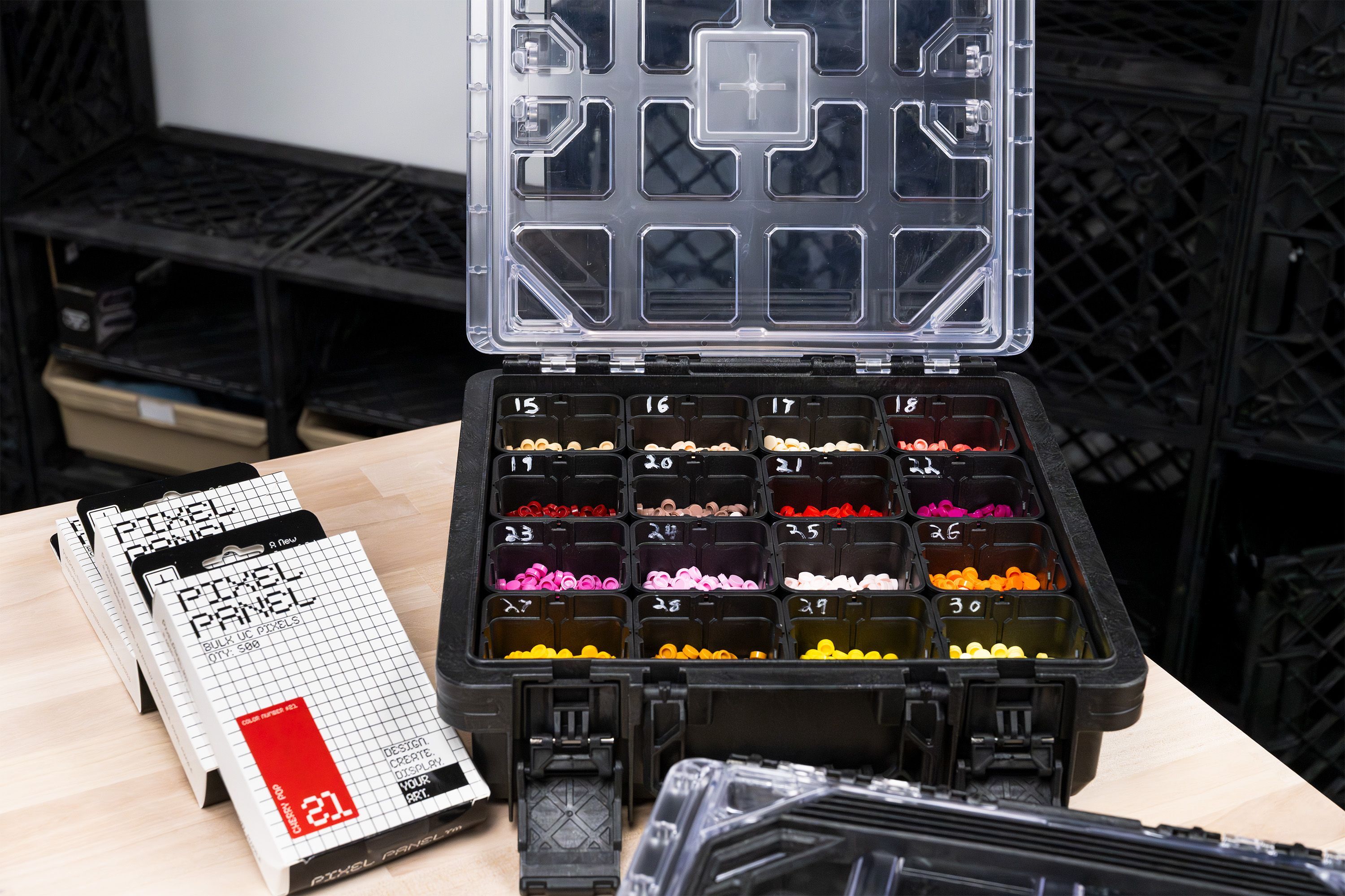 BaseBox™ organizer storing sorted PixelPanel™ pixels by color in removable bins