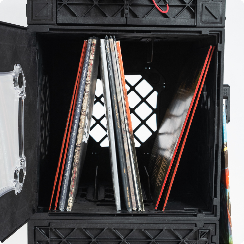 Black UbeCube CrateVinyl setup with CrateFins dividing and supporting records stored upright inside the crate.