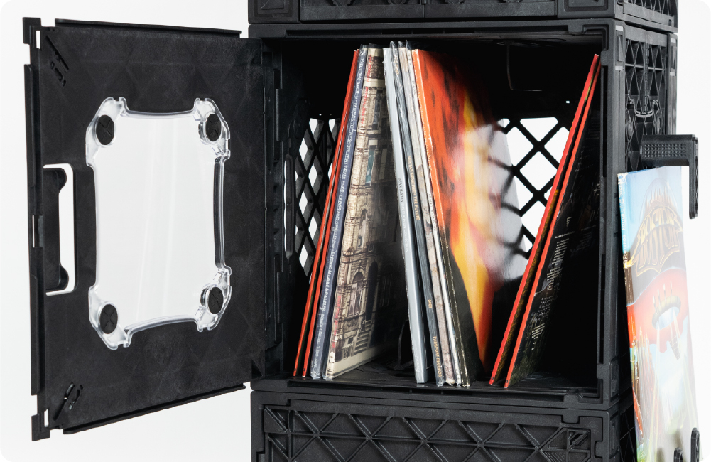 Open black UbeCube CrateVinyl setup storing vinyl records upright with a clear panel on the crate door.