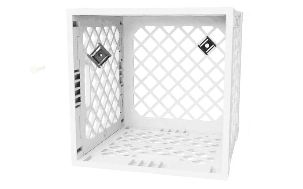 Animated GIF showing Screw Clips being installed through the side grid of a white UC02 lidless UbeCube crate to mount the crate to a wall.