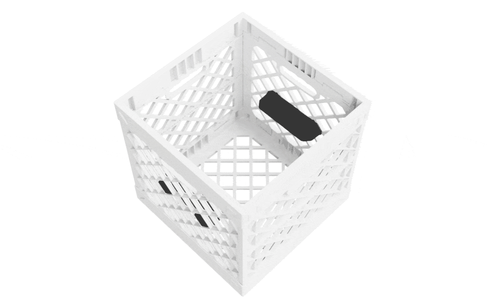 Animated GIF showing two black Tradesman trays being installed inside a white UC02 lidless UbeCube crate.