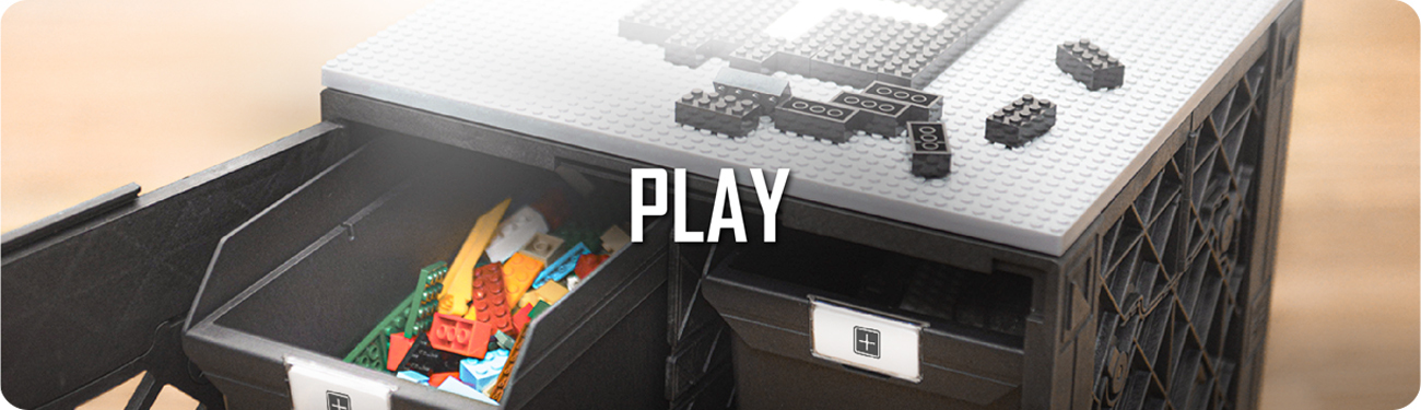 UbeCube CratePlay storage system with LEGO-compatible topper and open drawer filled with colorful building bricks, labeled ‘PLAY’.