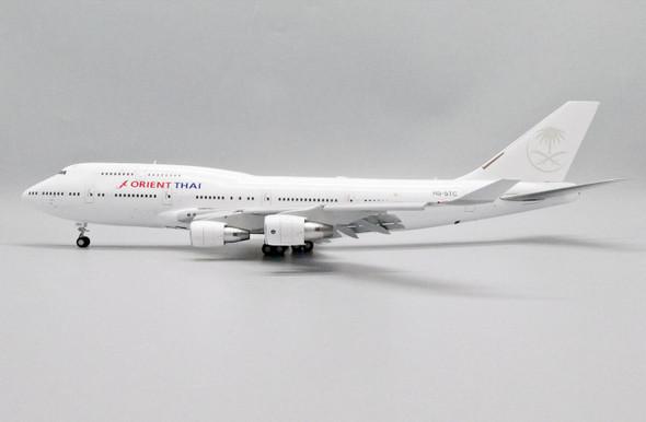 LH2255A | JC Wings 1:200 | Boeing 747-400 Orient Thai Airlines Reg: HS-STC With Stand + Original Aircraft Skin Keychain Flaps Down | is due: January 2024