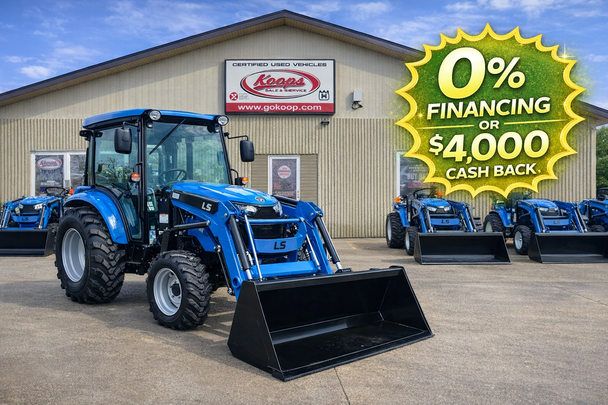 LS MT242 Premium Cab 42 HP compact diesel tractor with enclosed cab and front loader attached.
