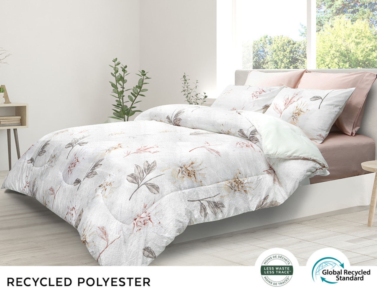 Brielle comforter set, side view. Shown in shades of white with delicate florals