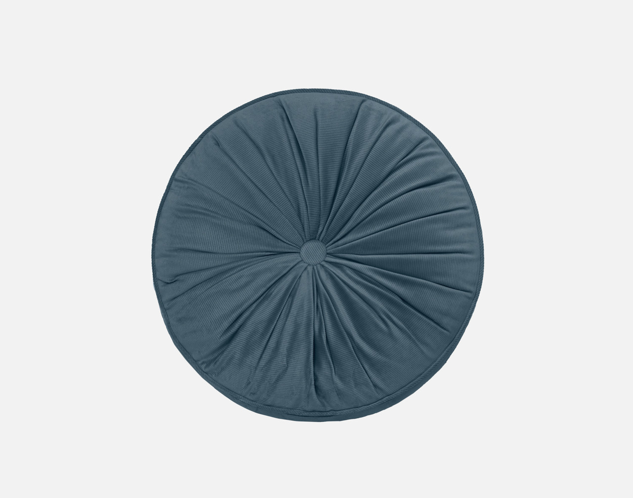 Our Round Corduroy Pillow in Ocean sitting against a solid white background.