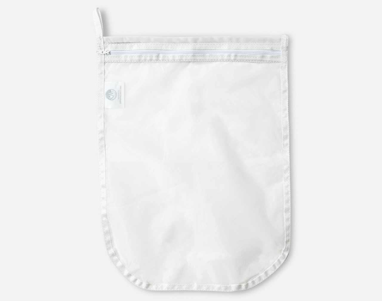 Our Mighty Mesh Laundry Bag in Medium sitting against a solid white background.