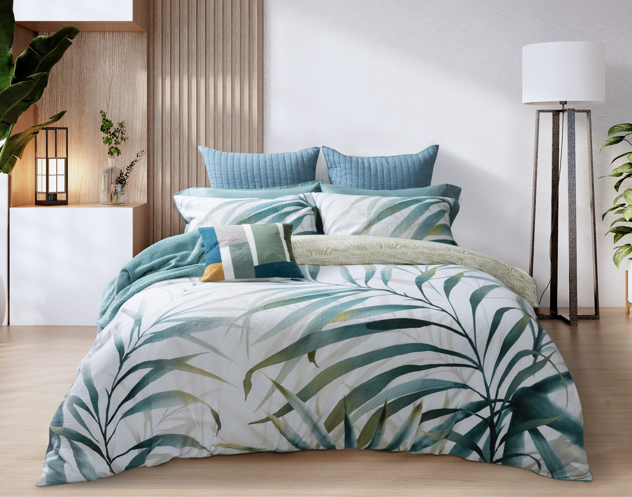 Front view of our Bonita Duvet Cover in a modern tropical white bedroom.