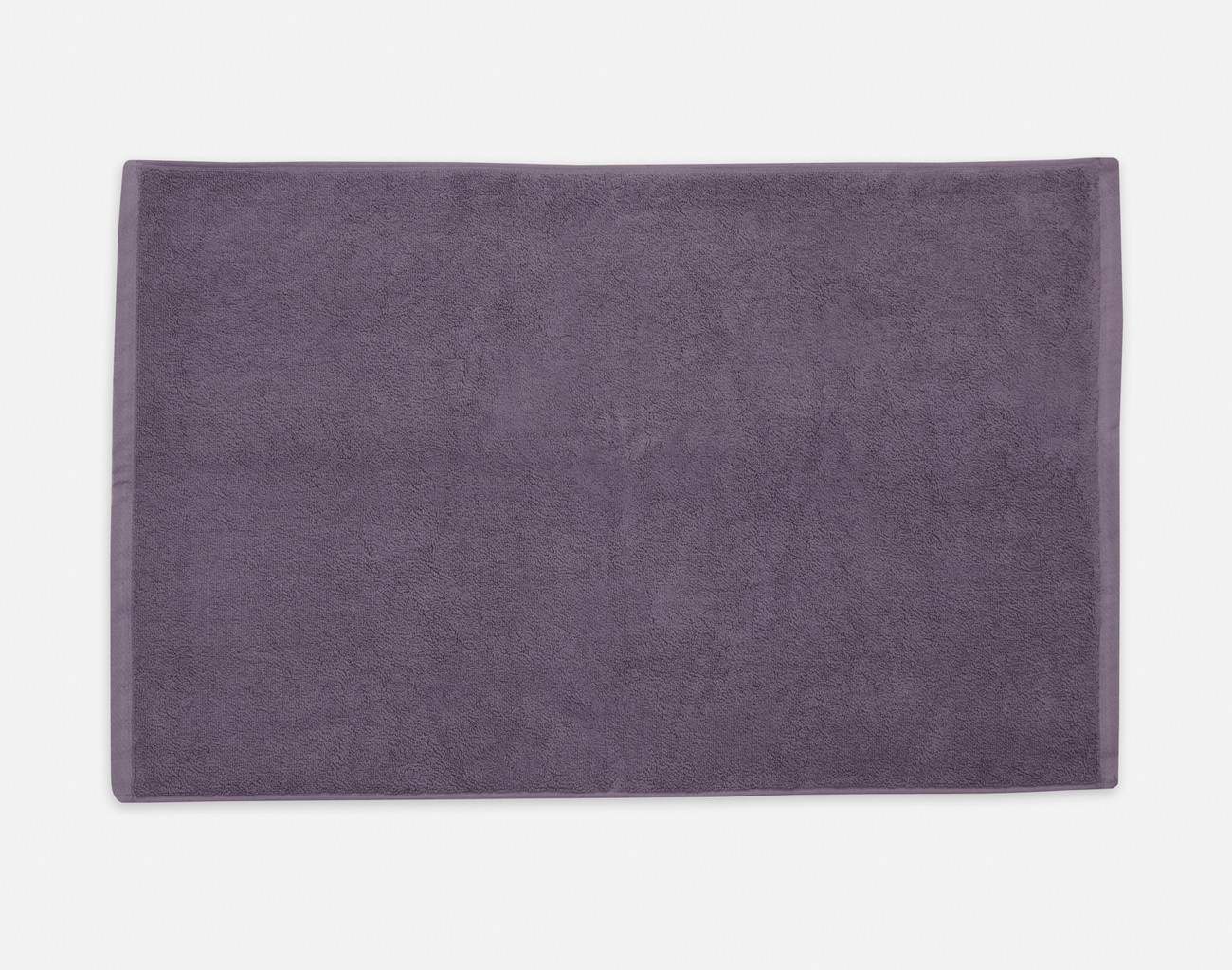 Top view of our Modal Cotton Bath Mat in Mulberry sitting against a solid white background.