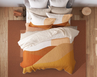 Top view of our Golden Hills Cotton Quilt Set to show it styled with white and beige.