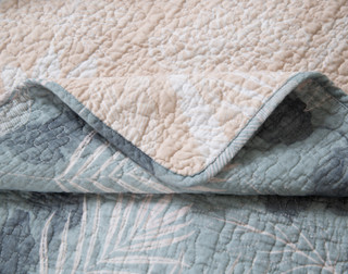 Close-up on the folded corner on our Retreat Cotton Quilt Set.
