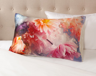 Angled view of our Mulberry Silk Pillowcase in Georgia resting on a white bed with a beige headboard.