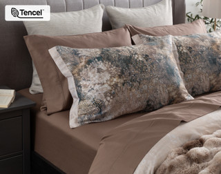 Our Captiva Pillow Shams dressing the head of a bed with the Captiva Duvet Cover and matching accessories.