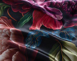 Ruffled fabric on our Matilde Mulberry Silk Pillowcase to show its luxuriously smooth surface.