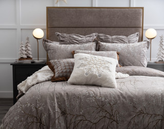 Front, off-centre view of our Luxembourg Velvet Duvet Cover dressing a queen bed with matching accessories.