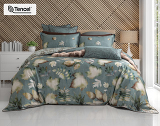 Front view of our Appalachia collection dressing a queen bed in an elegant wooden room.