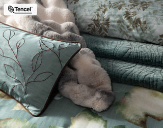 Close up on our Appalachia Boudoir Pillow Cover with other accessories and the Appalachia collection