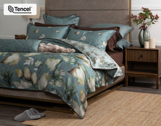 Angled view of our Appalachia collection dressing a queen bed with matching accessories.
