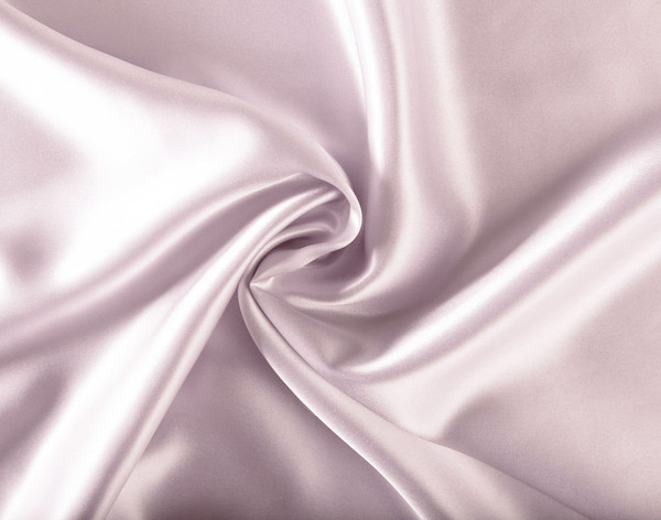 100% Mulberry Silk Pillowcase in Lavender Purple fabric close-up.