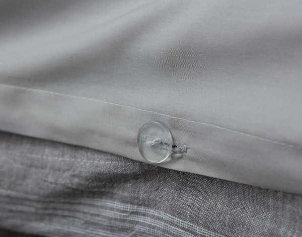 The Linen Blend Duvet Cover Sets feature button closures for a modern feel.