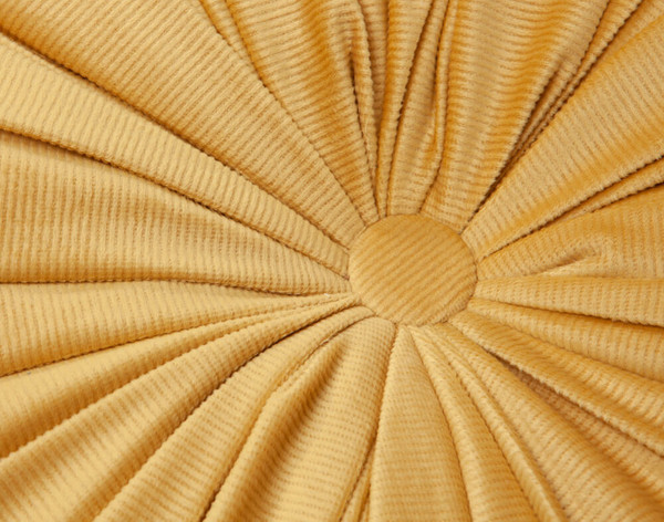 Close up of button detail on Round Corduroy Pillow in Ocean.
