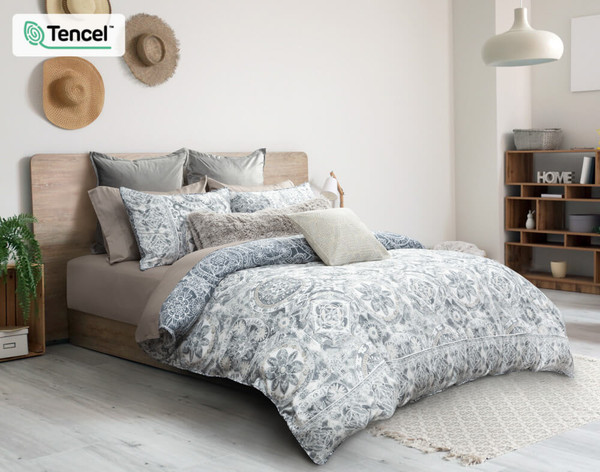 Sonesta Duvet Cover side angle, featuring a medallion print in White, Grey, Blue and Beige