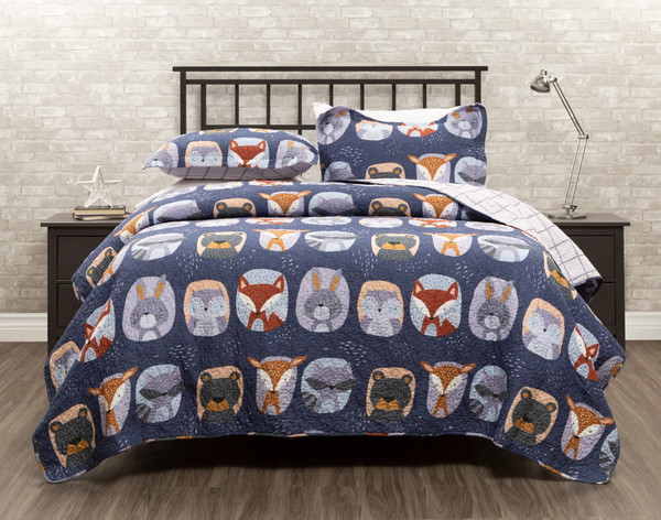 Our Forest Friends Cotton Kids Quilt Set dressed over a bed.