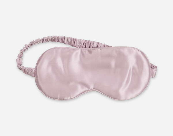 Close-up of our Silk Eye Mask in Lavender against a white background.