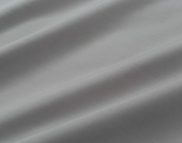 Close-up on the comfortable cotton fabric on our Cotton Percale Sheet Set in Grey.