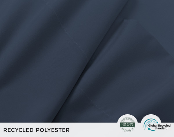 Close-up of scrunched up fabric on our Recycled Microfiber Sheet Set in Midnight to show its smooth and soft texture.