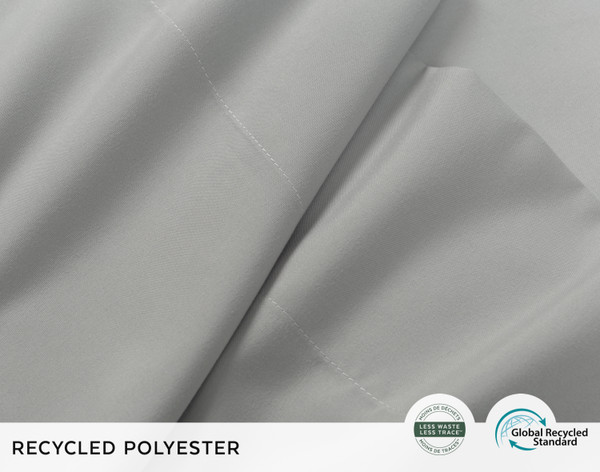 Close-up of scrunched up fabric on our Recycled Microfiber Sheet Set in Smoke to show its smooth and soft texture.